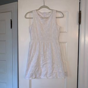 white dress with elegant flower embroidery